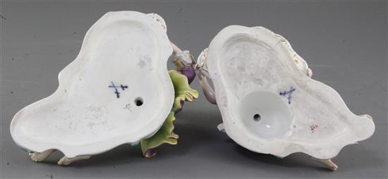 A pair of Meissen figural salts, late 19th century, length 17cm, tiny chips